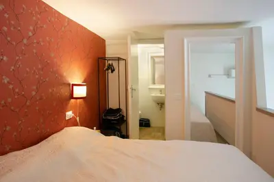 Letto o letti in una camera di Vigna Vecchia Studio - LOCAPPART