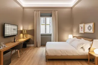 Letto o letti in una camera di BSJ15-Borgo San Jacopo Room