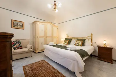 Letto o letti in una camera di Lungarno Vespucci Apartment by Charming Italy Tour