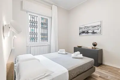 Letto o letti in una camera di GuestHost - Maragliano Cozy Flat with Balcony