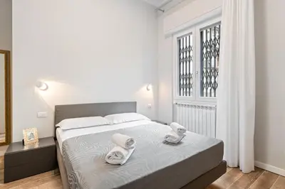 Letto o letti in una camera di GuestHost - Maragliano Cozy Flat with Balcony
