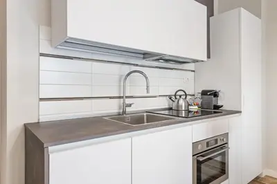 Cucina o angolo cottura di GuestHost - Maragliano Cozy Flat with Balcony