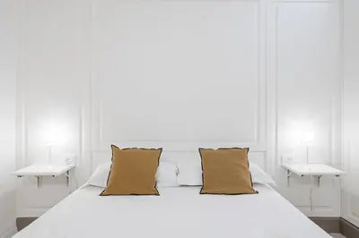 Letto o letti in una camera di GuestHost - Mercato Centrale Modern Flat