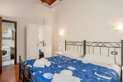 Letto o letti in una camera di GuestHost - Heart of Florence - San Lorenzo Lovely Apartment