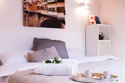 Letto o letti in una camera di Apartments Florence - Casa Amici