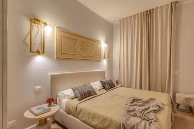 Letto o letti in una camera di Apartments Florence -Ponte Vecchio View