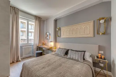 Letto o letti in una camera di Apartments Florence -Ponte Vecchio View