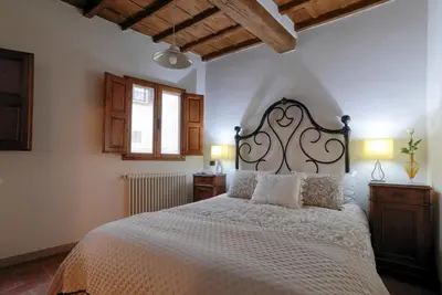 Letto o letti in una camera di Apartment LaCosta near Ponte Vecchio