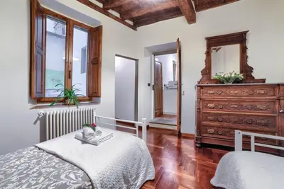 Letto o letti in una camera di Apartment LaCosta near Ponte Vecchio