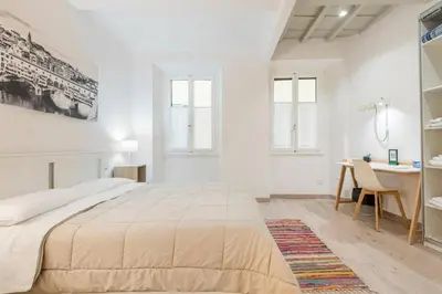 Letto o letti in una camera di Cozy apartment near Ponte Vecchio