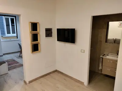 TV o dispositivi per l'intrattenimento presso Cozy apartment near Ponte Vecchio
