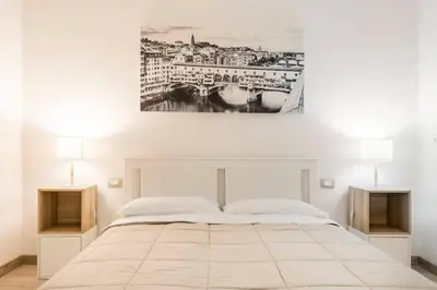 Letto o letti in una camera di Cozy apartment near Ponte Vecchio