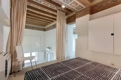 Letto o letti in una camera di Gold Suite