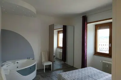 Letto o letti in una camera di Shelley Apartment