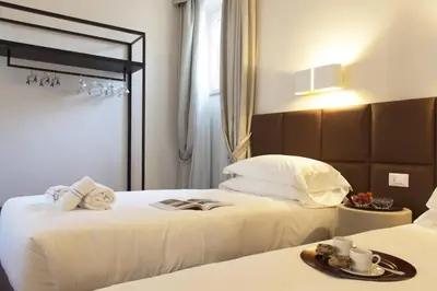 Letto o letti in una camera di Dianora