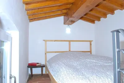 Letto o letti in una camera di La Tinaia