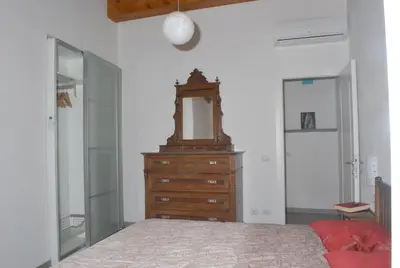 Letto o letti in una camera di La Tinaia