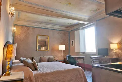 Letto o letti in una camera di Appartamenti Oriuolo