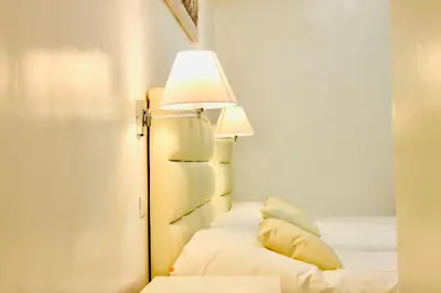 Letto o letti in una camera di Hotel 900 Toscana