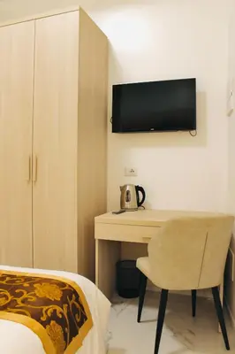 Letto o letti in una camera di Hotel 900 Toscana