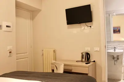 TV o dispositivi per l'intrattenimento presso Hotel 900 Toscana