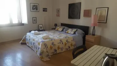 Letto o letti in una camera di Chiara Room