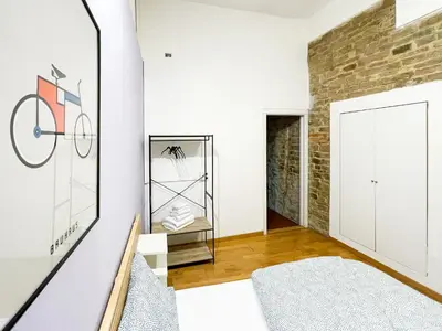 Letto o letti in una camera di Lovely Apartment near Piazza della Signoria