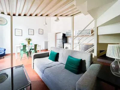 Area soggiorno di Lovely Apartment near Piazza della Signoria