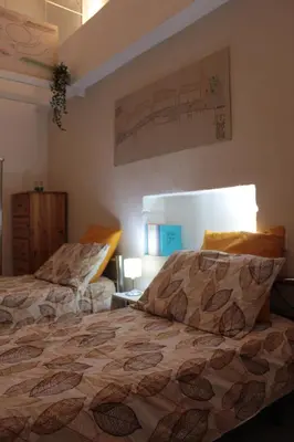 Letto o letti in una camera di Family and Friends Studio Florence
