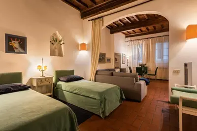 Letto o letti in una camera di Pitti Studio by Mmega