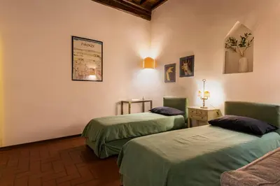 Letto o letti in una camera di Pitti Studio by Mmega
