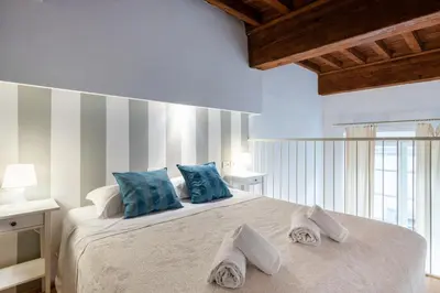 Letto o letti in una camera di GuestHost - Lovely Studio in the Heart of the Historic Center