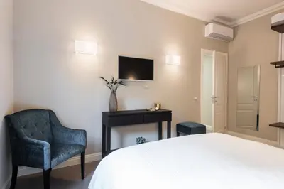 Letto o letti in una camera di Michelangelo Hideaway by Mmega