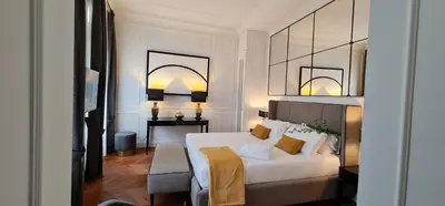 Letto o letti in una camera di Calzaiuoli3 Luxury Flat in the City Center of Florence