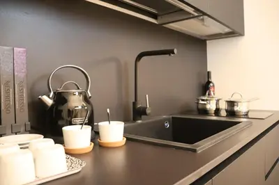 Cucina o angolo cottura di Calzaiuoli3 Luxury Flat in the City Center of Florence