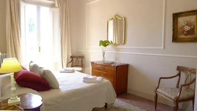 Letto o letti in una camera di Bartolomeo