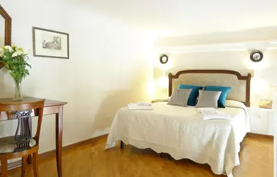 Letto o letti in una camera di Bartolomeo