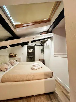 Letto o letti in una camera di Appartamento di Gabriela