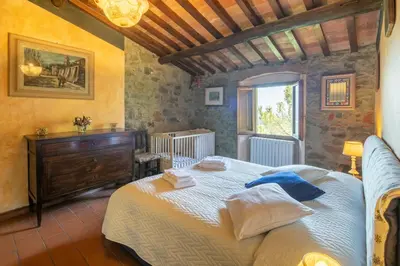 Letto o letti in una camera di Casa Rebecca by VacaVilla