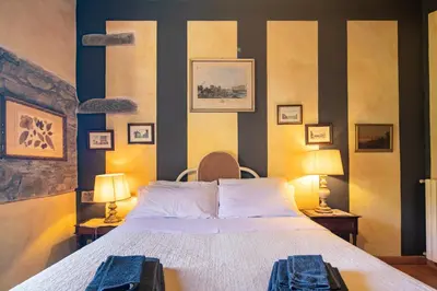 Letto o letti in una camera di Casa Rebecca by VacaVilla
