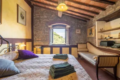 Letto o letti in una camera di Casa Rebecca by VacaVilla