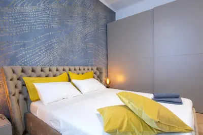 Letto o letti in una camera di Cavour Stylish House