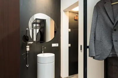 Bagno di F1RST Suite Apartment & SPA