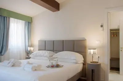 Letto o letti in una camera di Dafne magnificent attic overlooking the Duomo