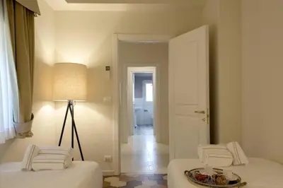 Letto o letti in una camera di Dafne magnificent attic overlooking the Duomo