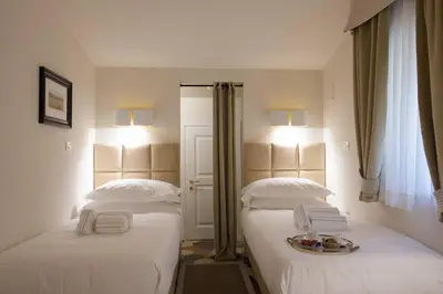 Letto o letti in una camera di Dafne magnificent attic overlooking the Duomo
