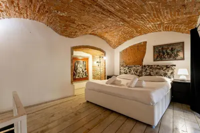 Letto o letti in una camera di Oltrarno Loft by Halldis
