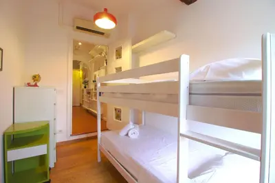Letto o letti in una camera di Gilda