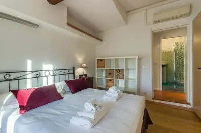 Letto o letti in una camera di Gilda