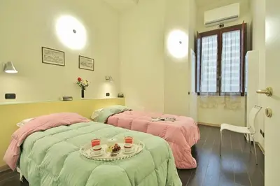 Letto o letti in una camera di Malespini by Halldis